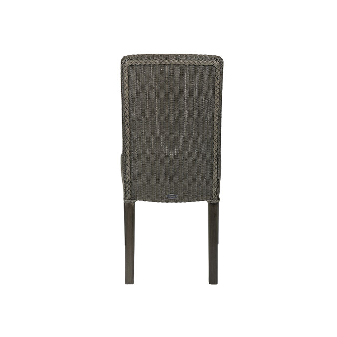 Rückansicht eines braunen Stuhls aus Rattan mit Holzbeinen, geeignet für Esszimmer oder Garten