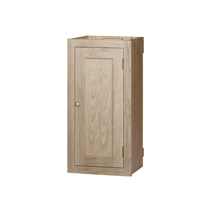 Hängeschrank aus hellem Holz mit einer Tür und rundem Knauf, schlichtes und zeitloses Design