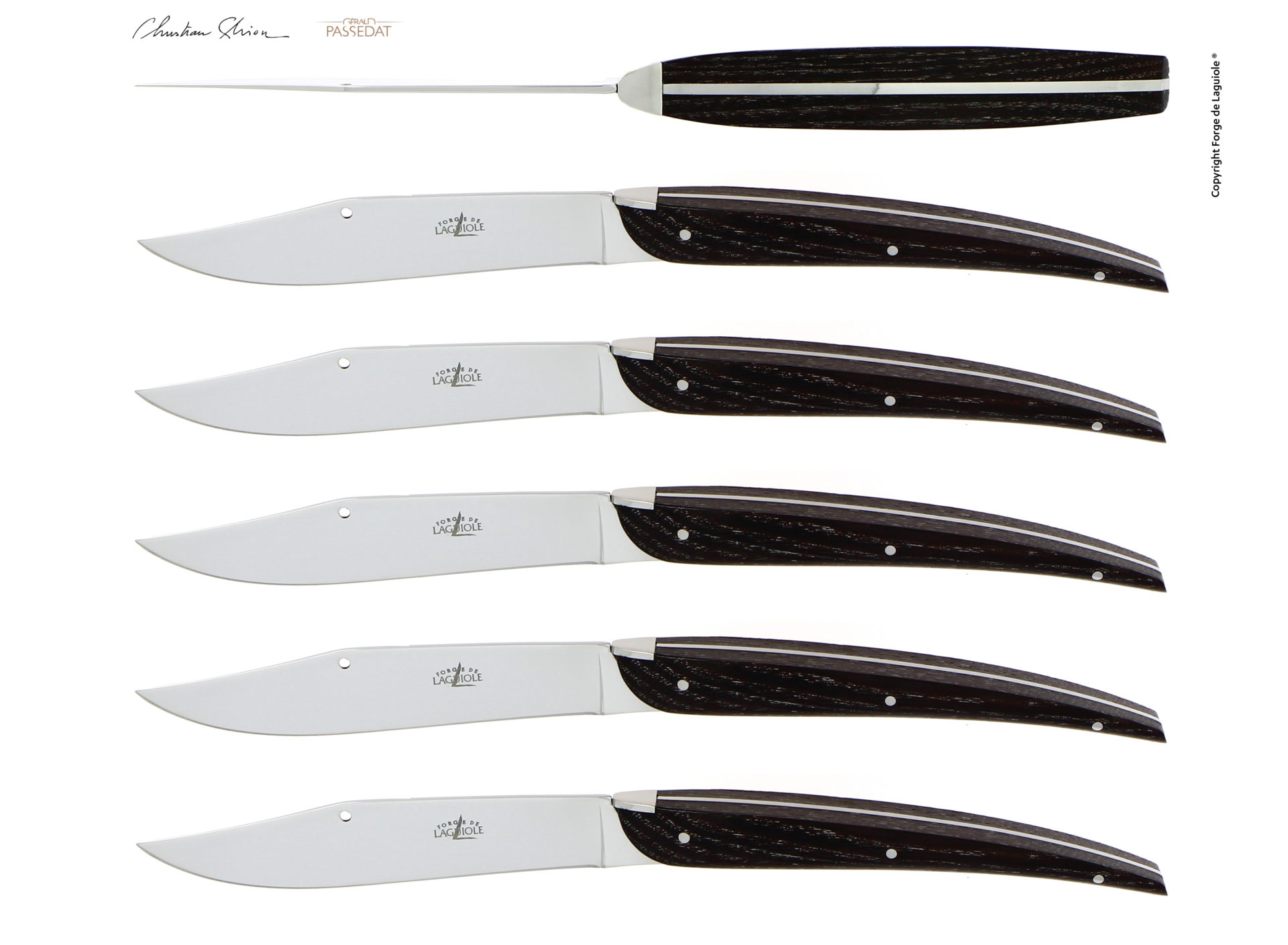 Sechs Laguiole Steakmesser mit eleganten dunklen Holzgriffen und polierten Klingen, nebeneinander angeordnet