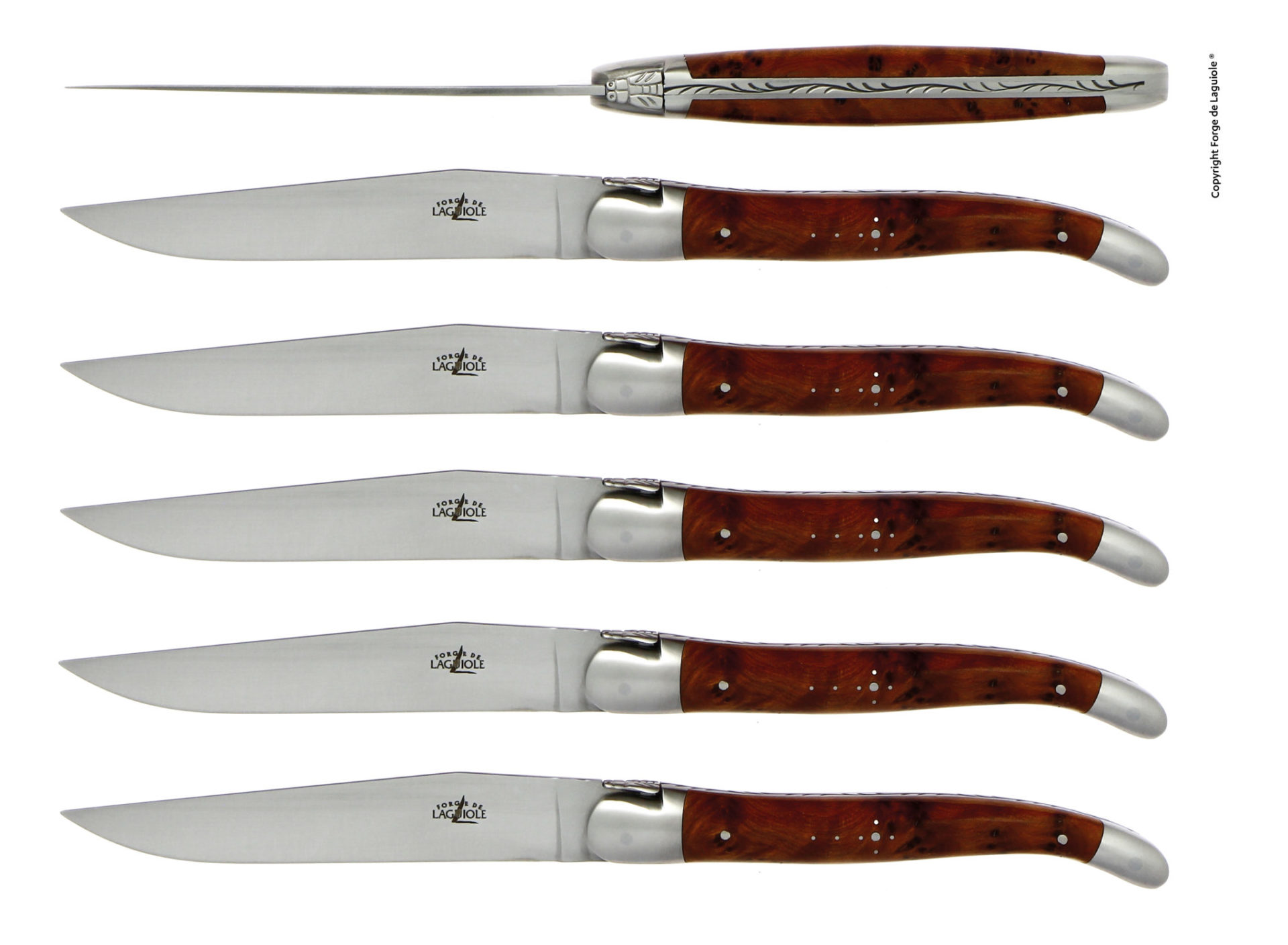 Sechs Laguiole Steakmesser mit Edelstahlklinge und braunem Holzgriff, klassische Verzierung auf dem Messergriff sichtbar