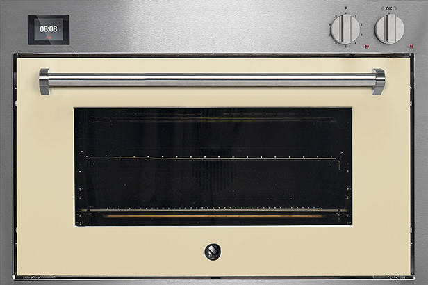 Moderner Einbau-Backofen mit cremefarbener Tür, digitaler Zeitanzeige und zwei Bedienknöpfen aus Edelstahl